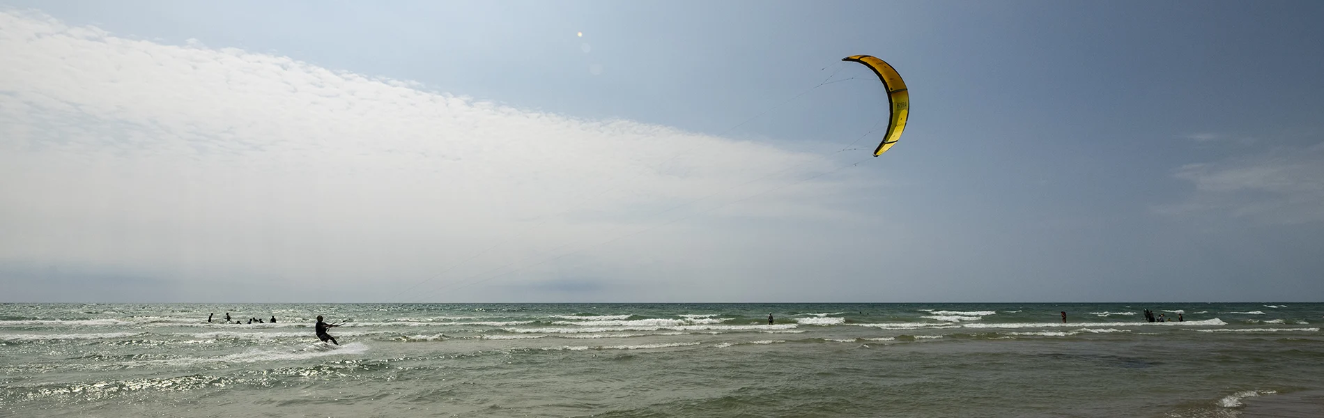 beach with a wakeboarder